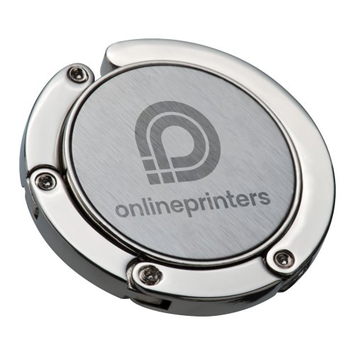 Silberner Handtaschenhalter aus Metall mit rutschfester Unterseite.