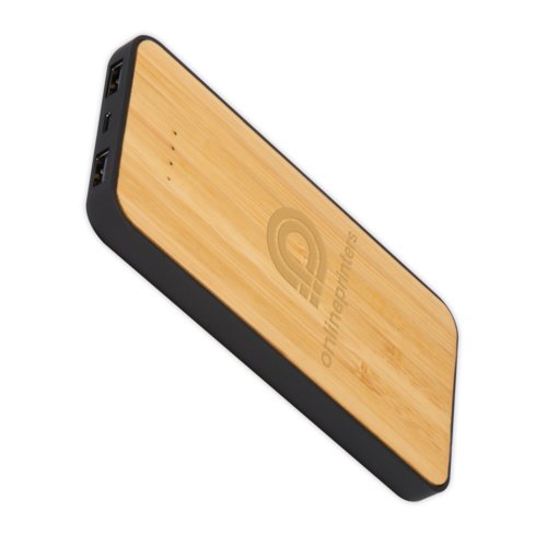 Beige Powerbank/Wireless Charger aus Bambus mit USB-Anschlssen.